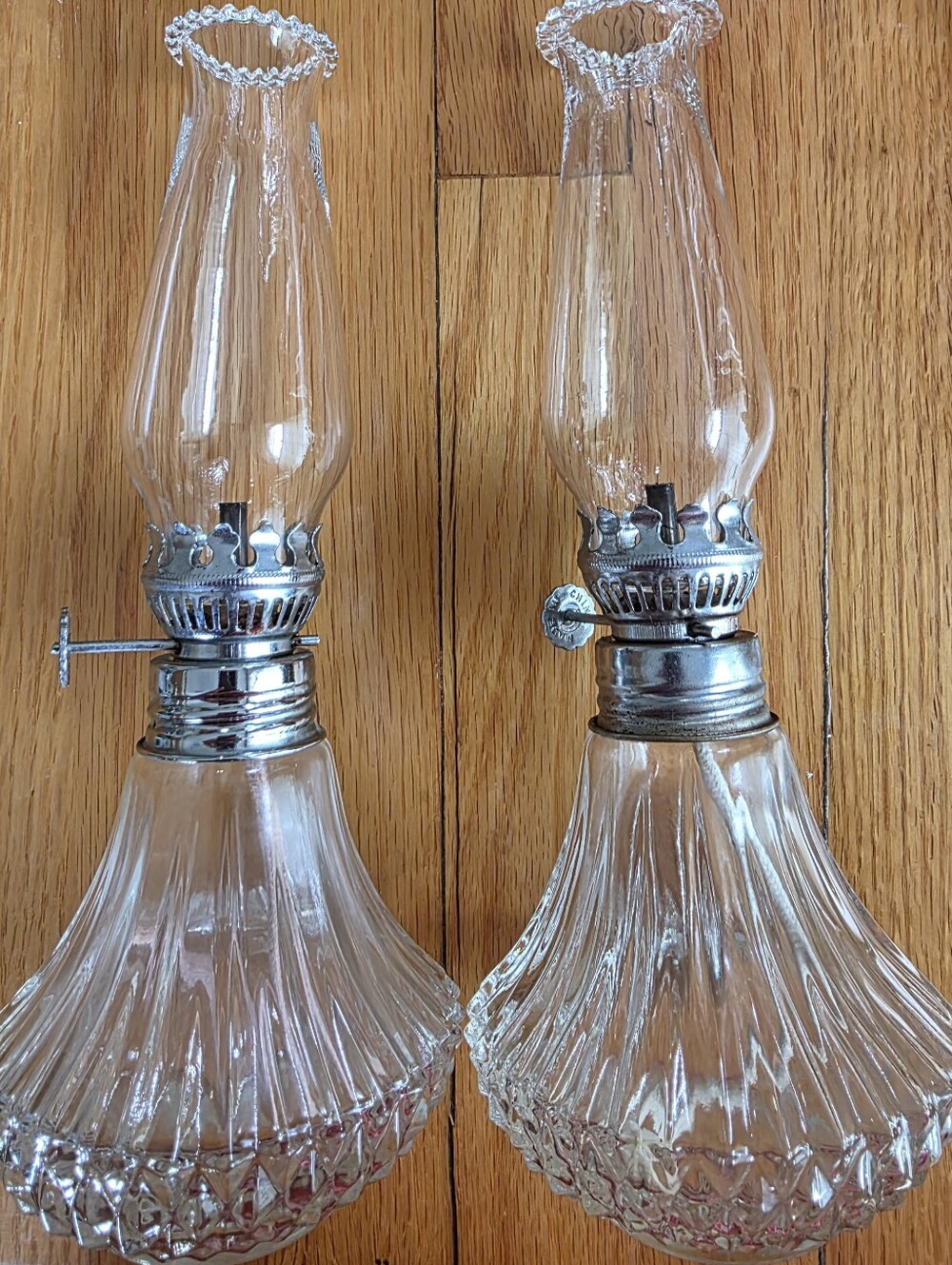 Clear Glass Oil Lamp Pair with Silver-Tone Metal Accents. Lamplight Farms